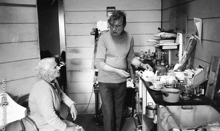 Francis Bacon at his kitchen with his cleaning lady Jean Ward. London 1979
