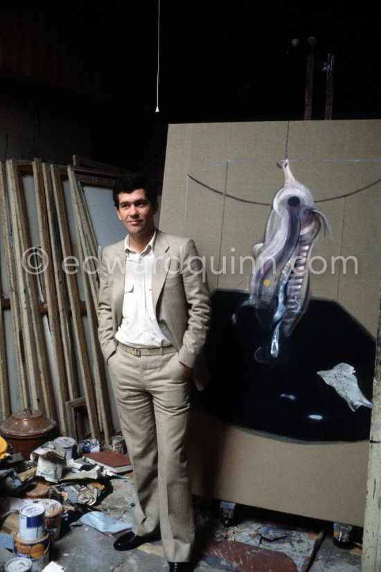 John Edwards with the painting "Carcass of Meat and Bird of Prey" at Francis Bacon\'s Reece Mews studio in London 1980. - Photo by Edward Quinn