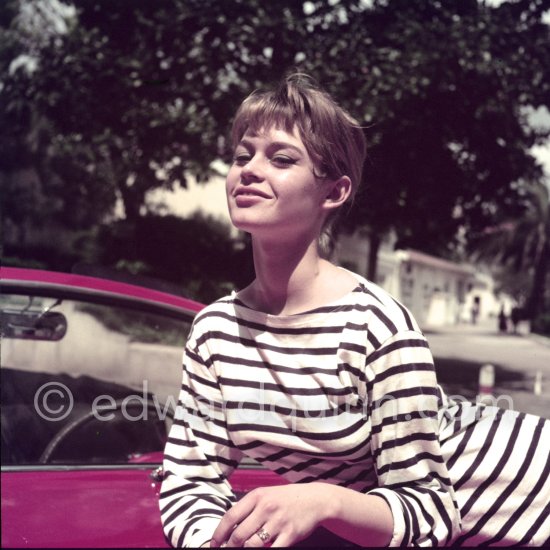 Brigitte Bardot with Repetto ballerinas, Capri trousers and a Breton shirt posing ever so nicely on a Simca Aronde Week-end during the Cannes Film Festival 1956. She got the car (1955. or 56 Simca Aronde Week-end) as a fee for making advertising for Simca. Cannes Film Festival 1956. - Photo by Edward Quinn