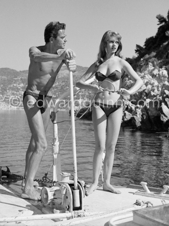 Brigitte Bardot and Howard Vernon during filming of "Manina, la fille sans voiles" on the yacht Suraya. Villefranche harbor 1952. - Photo by Edward Quinn