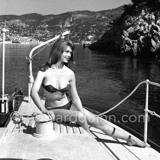 Brigitte Bardot during filming of "Manina, la fille sans voiles" on the yacht Suraya. Villefranche harbor 1952. - Photo by Edward Quinn
