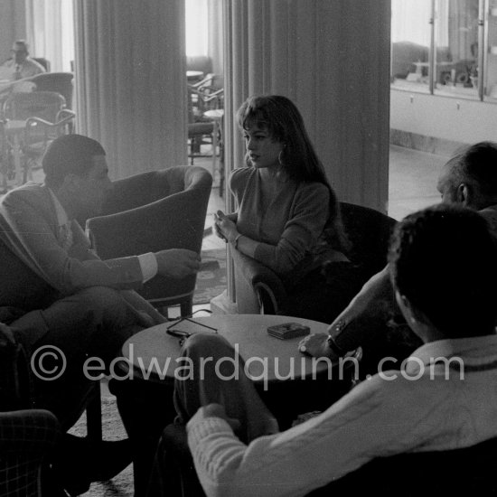 Brigitte Bardot negotiates a contract at the Hotel Negresco, Nice 1955. - Photo by Edward Quinn