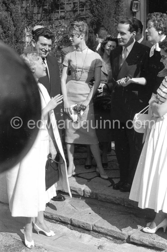 Brigitte Bardot and François Mitterrand. On the left Michèle Morgan, right Edwige Feuillère. Cannes Film Festival 1956. - Photo by Edward Quinn