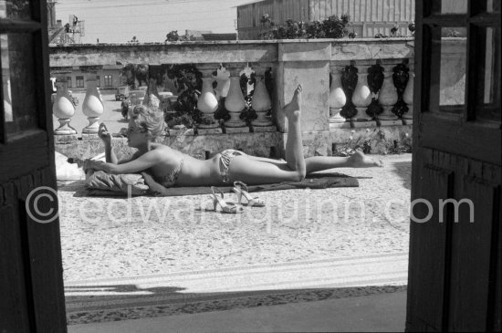 Brigitte Bardot relaxing. Studios de la Victorine, Nice 1956. - Photo by Edward Quinn