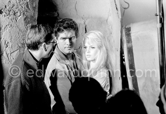 Roger Vadim, Brigitte Bardot and Stephen Boyd during the shooting of "Les Bijoutiers du clair de lune" ("The Night Heaven Fell"), on the grounds of the Victorine Film Studios in Nice. Directing was Brigitte’s ex-husband Roger Vadim (left). Nice 1958. - Photo by Edward Quinn