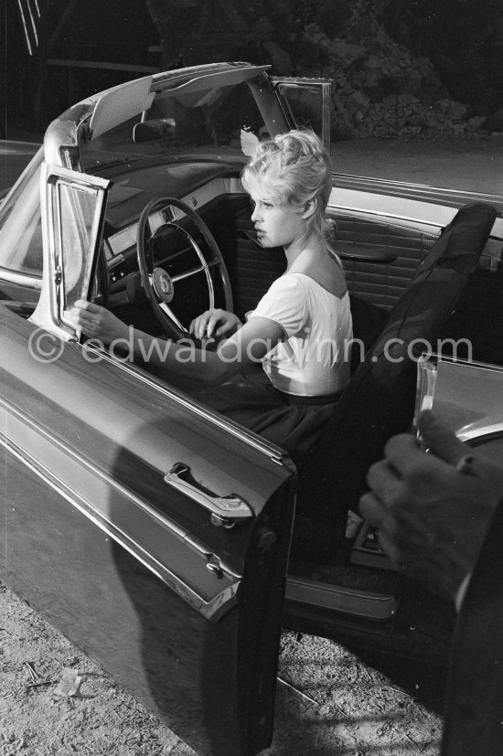 Brigitte Bardot. Studios de la Victorine, during filming of "Come dance with me". Nice 1959. Car: Ford Fairlane 500 Sunliner Convertible 1957. - Photo by Edward Quinn