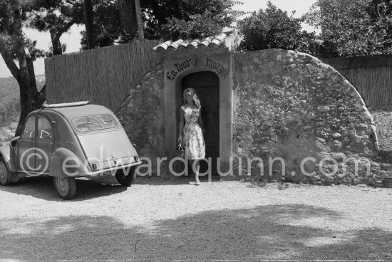Brigitte Bardot. La Tour Margot, Saint-Tropez 1959. Car: Citroën 2CV. - Photo by Edward Quinn