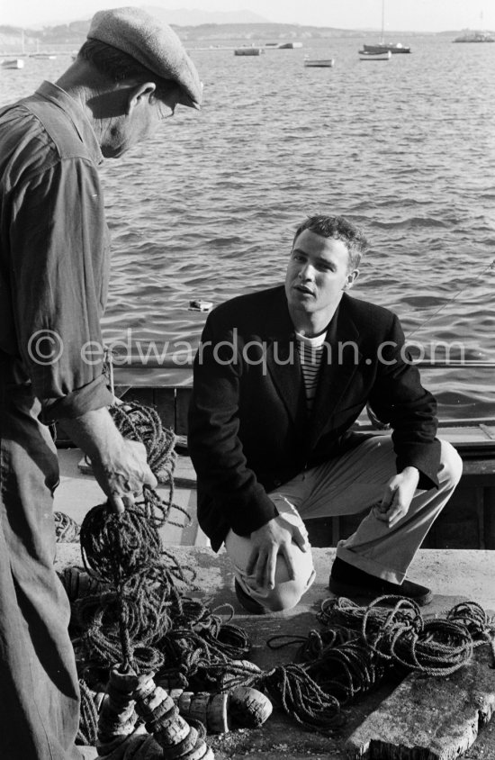 Marlon Brando at the port in Bandol 1954. - Photo by Edward Quinn