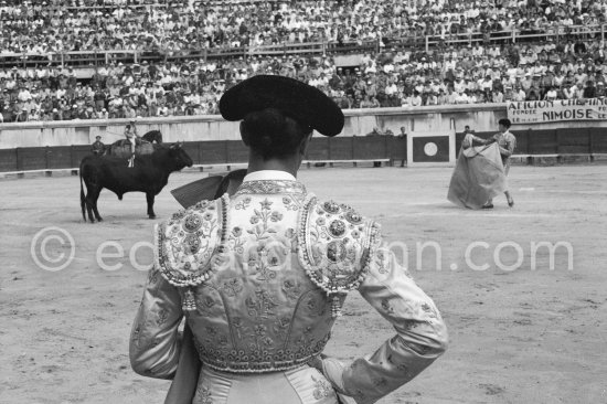 Luis Miguel Dominguin watching Paco Camino. Nimes 1960. A bullfight Picasso attended (see "Picasso"). - Photo by Edward Quinn