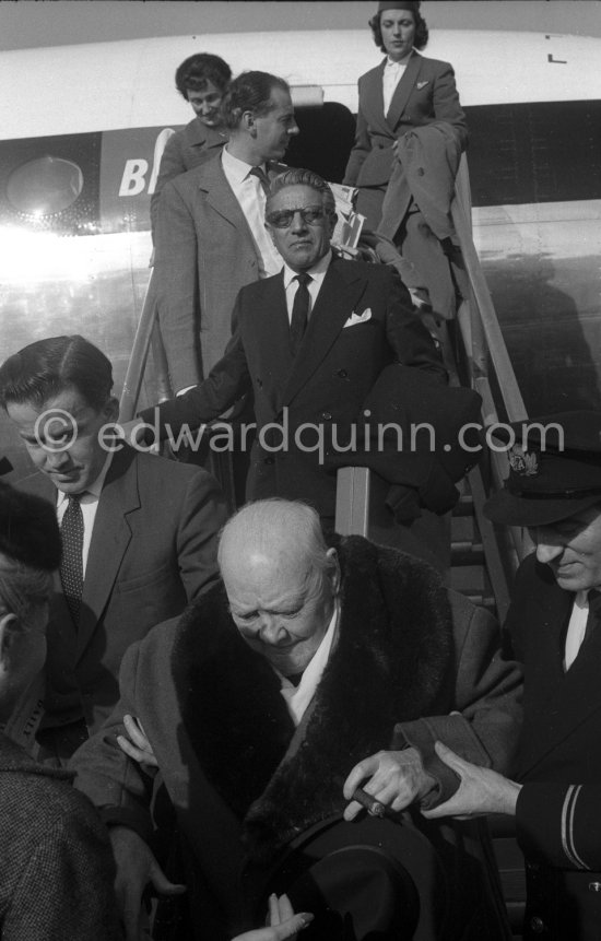 Sir Winston Churchill, Aristotle Onassis, Montague Brown, Churchill’s secretary (left). Arrival at Nice Airport 1961. - Photo by Edward Quinn