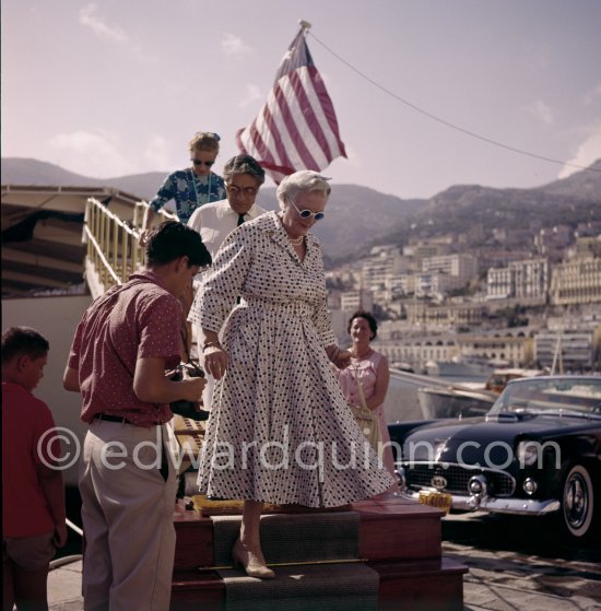 Lady Clementine Churchill, Aristotle Onassis and Tina Onassis leaving yacht Christina. Monaco 1959. - Photo by Edward Quinn