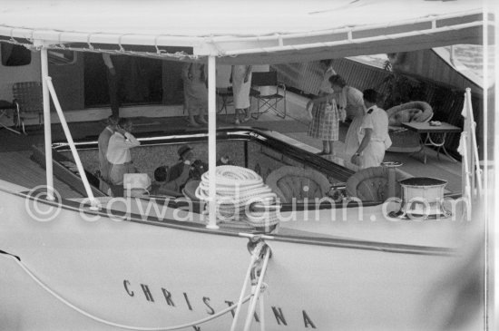 Aristotle Onassis and Sir Winston Churchill. On board Christina, Churchill sitting in lowerable swimming pool. Monaco harbor, about 1957. - Photo by Edward Quinn