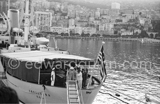 Sir Winston Churchill and Aristotle Onassis are leaving the yacht Christina. Monaco harbor 1958. - Photo by Edward Quinn