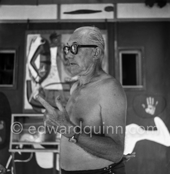 Le Corbusier (Charles-Édouard Jeanneret) at the small restaurant next to his vacation cabin Le Cabanon. Roquebrune-Cap-Martin 1953. - Photo by Edward Quinn