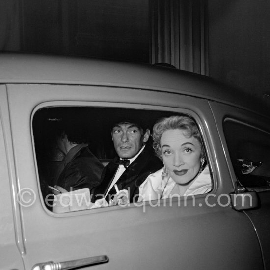 Marlene Dietrich and Jean Marais, leaving the Sporting d\'Eté in Monte Carlo after a gala night in 1954. - Photo by Edward Quinn