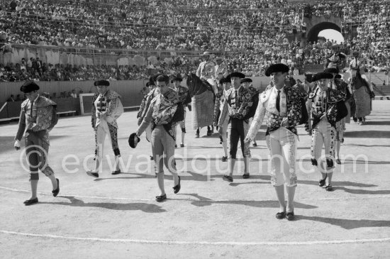 The participants enter the bull ring in a parade, called the paseo. Luis Miguel Dominguin on the right, his brother-in-law, Antonio Ordóñez, extreme left. Arles 1960. A bullfight Picasso attended (see "Picasso"). - Photo by Edward Quinn