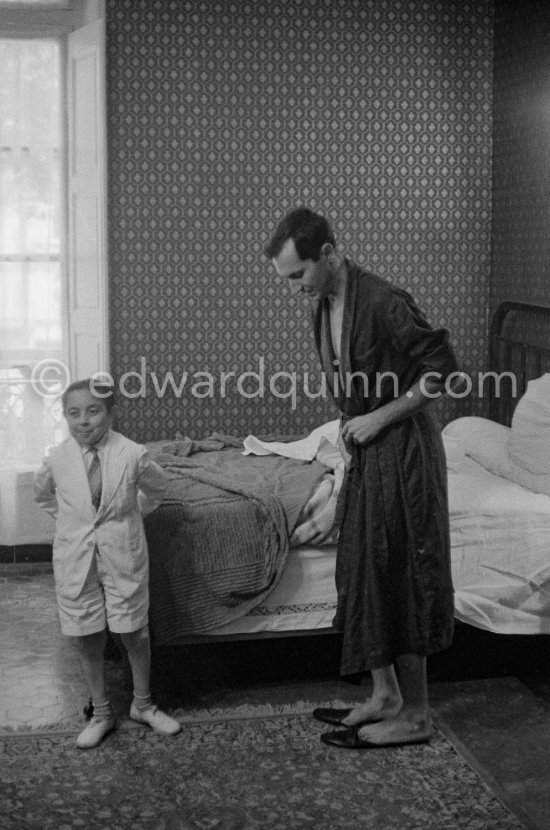 Bullfighter Luis Miguel Dominguin and his "mascot" Marcellino. Hotel Nord-Pinus, Arles 1960. - Photo by Edward Quinn