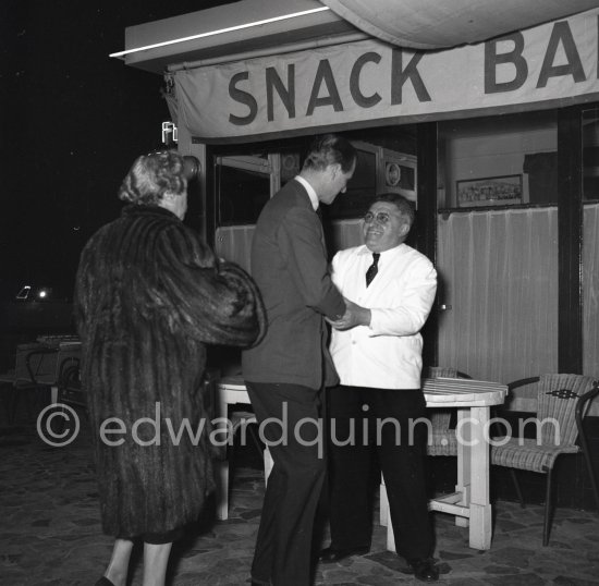Prince Philip, Duke of Edinburgh with his aunt, the Marquioness of Milford Haven, and Mr. Felix after a dinner at the famous restaurant "Felix". Cannes 1955. - Photo by Edward Quinn