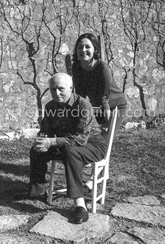 Max Ernst and Dorothea Tanning in the garden of their home with "La fête à Seillans", 1964. Seillans 1966. - Photo by Edward Quinn