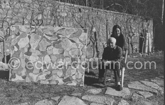 Max Ernst and Dorothea Tanning in the garden of their home with "La fête à Seillans". Seillans 1966. - Photo by Edward Quinn