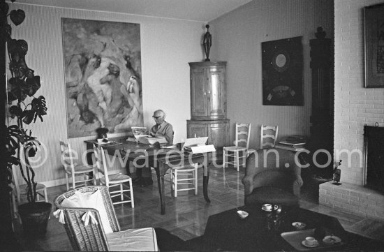 Max Ernst working on the mock-up of the book Max Ernst by Edward Quinn. Seillans 1975. - Photo by Edward Quinn