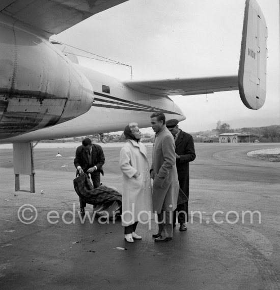 Zsa Zsa Gabor and Porfirio Rubirosa in front of the private plane of Porfirio Rubirosa, a converted North American B-25 Mitchell, at Cannes Airport in 1954. North American B-25 Mitchell B-25H-1NA 43-4432 (N10V). See https://bit.ly/2XS08rs. Was as "Berlin Express" in the 1970 movie Catch-22. Today at Eagle Hangar, EAA Aviation Museum, Oshkosh. - Photo by Edward Quinn