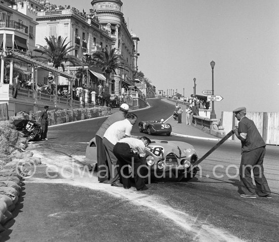 The accident at Sainte-Dévote: Robert Manzon, (56) Simca Gordini T15S, Reg Parnell, (72) Aston Martin DB3, The Aston engine of Parnell blows up in the Ste-Devote and aligns his car against the straw bales, Stagnoli brakes too hard and does a double spin. Moss, Jaguar C-Type XKC 003 and Manzon find an obstructed road, spin and end up against the poor Aston, then Hume spins and reverses into the pile. Fortunately nobody gets hurt. Moss restarted after the accident, but got a black flag for receiving outside help. Monaco Grand Prix 1952, transformed into a race for sports cars. This was a two day event, the Sunday for the up to 2 litres (Prix de Monte Carlo), the Monday for the bigger engines, (Monaco Grand Prix). - Photo by Edward Quinn