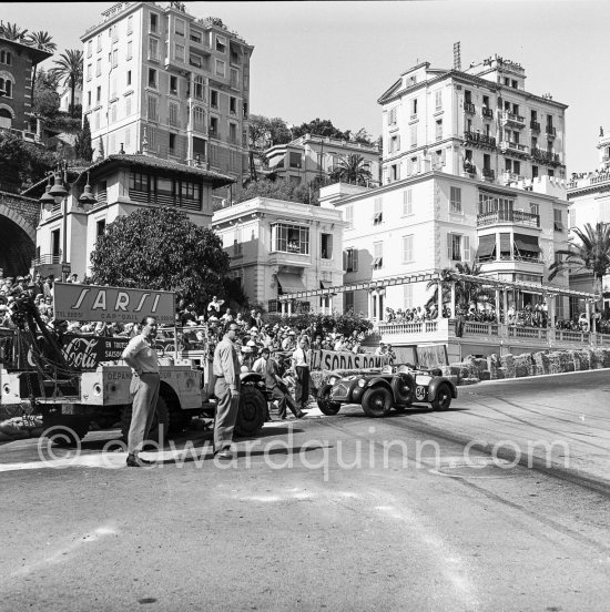 The accident at Sainte-Dévote: Anthony Hume, (84) (left) Allard J2. Monaco Grand Prix 1952, transformed into a race for sports cars. This was a two day event, the Sunday, Prix Monte Carlo, for the up to 2 litres (Prix de Monte Carlo), the Grand Prix, Monday for the bigger engines, (Monaco Grand Prix). The Aston engine of Parnell blows up in the Ste-Devote and aligns his car against the straw bales, Stagnoli brakes too hard and does a double spin. Moss, Jaguar C-Type XKC 003 and Manzon find an obstructed road, spin and end up against the poor Aston, then Hume spins and reverses into the pile. Fortunately nobody gets hurt. Moss restarted after the accident, but got a black flag for receiving outside help. - Photo by Edward Quinn