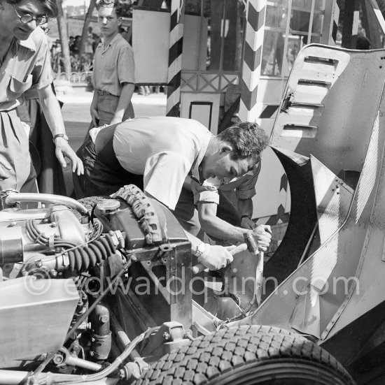 At the Monaco Grand Prix 1952, transformed into a race for sports cars, Stirling Moss (on right) works on his damaged Jaguar C-Type XKC 003 No. 78. (This was a two day event, a Saturday for the 2 liters, the
Sunday for the bigger engines.) - Photo by Edward Quinn