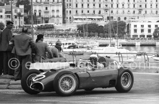 Eugenio Castellotti in Fangio\'s (20) Ferrari-Lancia D50. Monaco Grand Prix 1956. - Photo by Edward Quinn