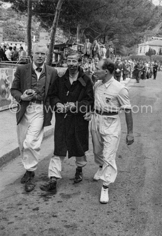 Mike Hawthorn (left), "Speeding dentist" Tony Brooks and Stirling Moss. Both Hawthorn and Moss had been eliminated in a crash at the Chicane while Brooks finished second with his Vanwall. Monaco Grand Prix 1957. - Photo by Edward Quinn