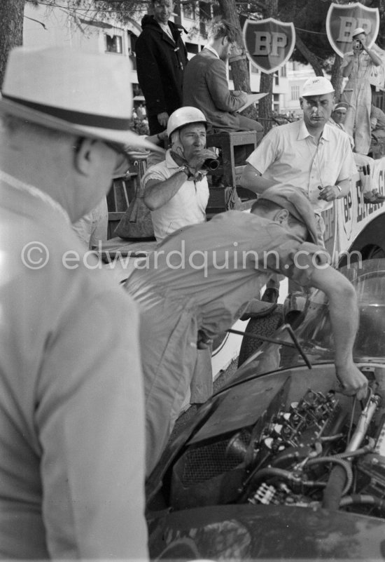 Stirling Moss, (28) Vanwall VW7, stops at the pits with valve problems. Monaco Grand Prix 1958. - Photo by Edward Quinn