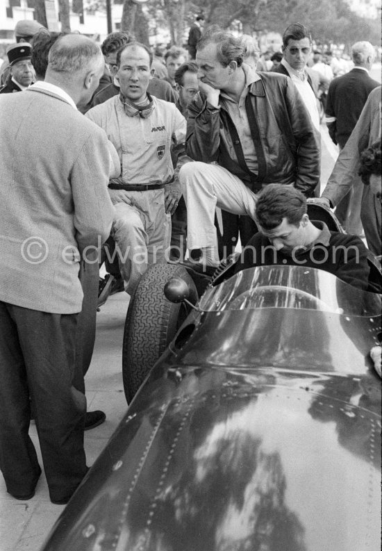 From left Stirling Moss, Colin Chapman, founder of Lotus Cars, Jo Bonnier in the B.R.M. P25. Monaco Grand Prix 1959. - Photo by Edward Quinn