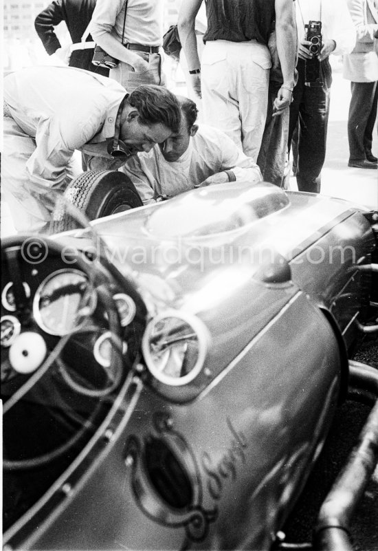 Stirling Moss and Innes Ireland studying the suspension of the Scarab of Lance Revetlow. Monaco Grand Prix 1960 - Photo by Edward Quinn