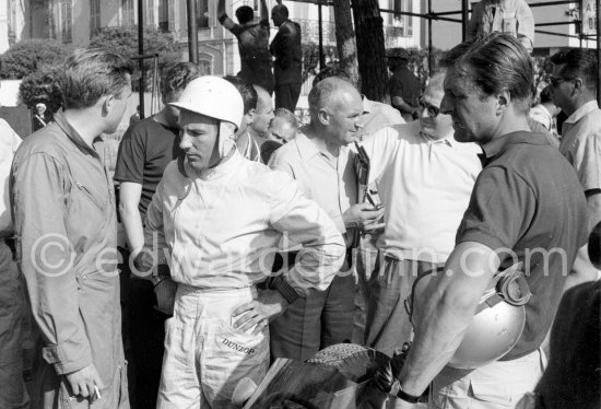 From left: Lance Reventlow, Stirling Moss, Wolfgang von Trips. The Scarabs were disappointingly slow and to find out if it was the driver or the car, Reventlow let Stirling Moss try one. He did a better time but it would not have been enough to qualify. Monaco Grand Prix 1960. - Photo by Edward Quinn