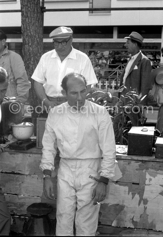 Stirling Moss. His father in  the background. Monaco Grand Prix 1960. - Photo by Edward Quinn