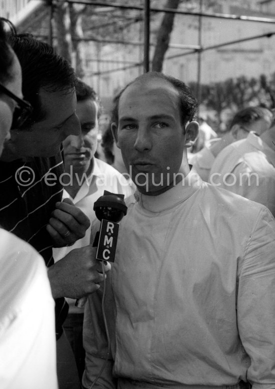 Stirling Moss interviewed. Monaco Grand Prix 1960. - Photo by Edward Quinn