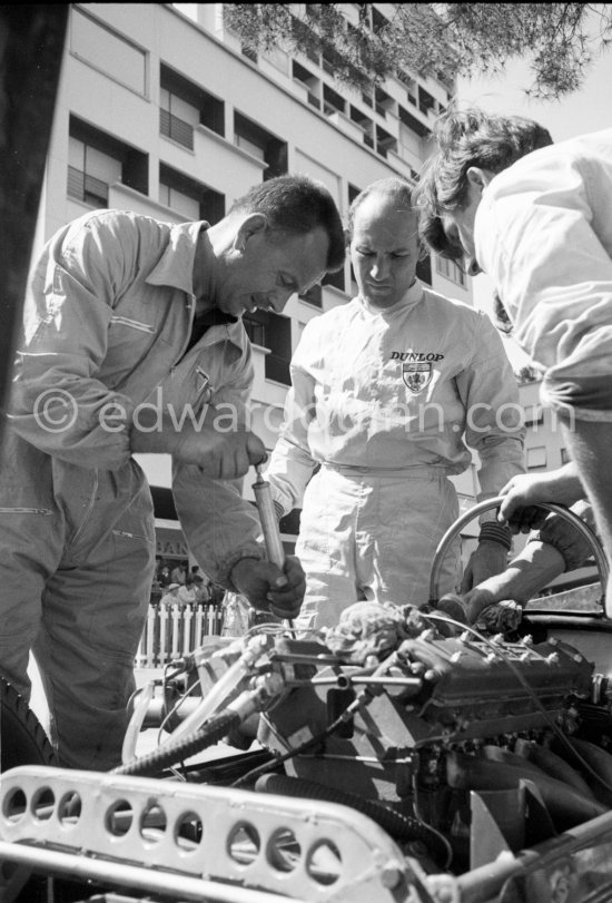 Stirling Moss, (20) Lotus-Climax. Alf Francis (left), chief mechanic of Rob Walker Racing Team. Monaco Grand Prix 1961. - Photo by Edward Quinn