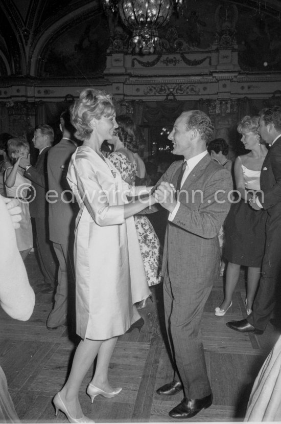 Stirling Moss at the gala after the race with Shirley Adams, his American friend. Monaco Grand Prix 1961. - Photo by Edward Quinn
