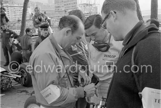 Jim Clark and Stirling Moss, who commentates for ABC Wide World of Sport. Monaco Grand Prix 1964. - Photo by Edward Quinn