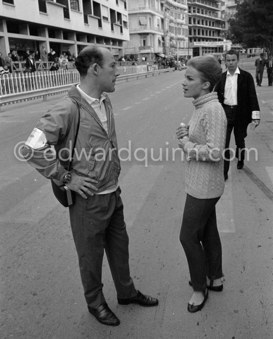 Stirling Moss, commentates for ABC Wide World of Sport (who is she?). Monaco Grand Prix 1964. - Photo by Edward Quinn