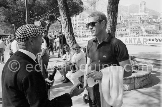 Steve McQueen and Louis Chiron, former GP Driver and commissaire général of the Monaco GP. Monaco GP 1965. - Photo by Edward Quinn
