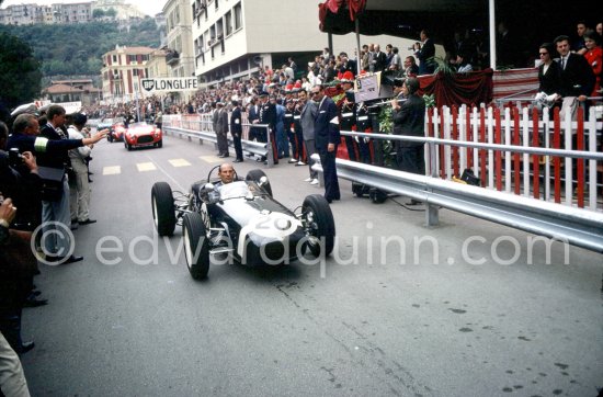 Stirling Moss, Lotus 18 (winner GP Monaco 1961), in the parade of the Club des Anciens Pilotes de Grand Prix, now Grand Prix Drivers Club GPDC. Monaco Grand Prix 1965.x 1965. - Photo by Edward Quinn