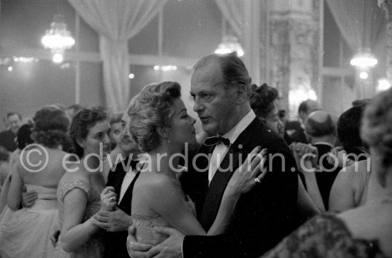 Curd Jürgens, then husband of Eva Bartok, was accompanied by the actress Cornell Borchers. New Year\'s Eve Gala, Monte Carlo 1956. - Photo by Edward Quinn
