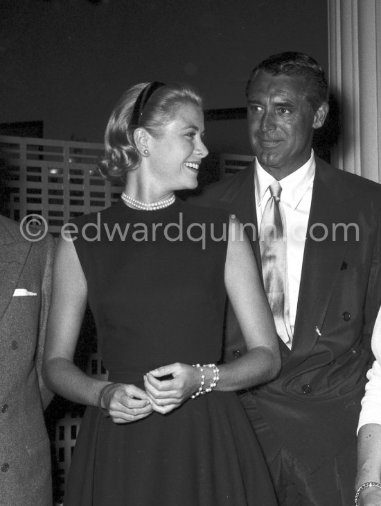Grace Kelly and Cary Grant at a Cocktail Party given by Alfred Hitchcock for his Film "To catch a Thief". Cannes 1954. Château des Croix des Gardes, Cannes 1954. - Photo by Edward Quinn