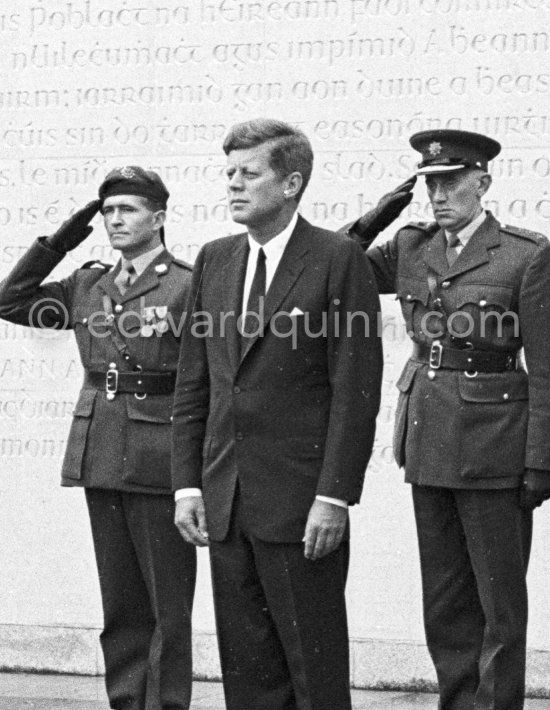 John F. Kennedy, official visit. Members of the army salute as JFK stands to attention, during the Arbour Hill ceremony. Dublin 1963. - Photo by Edward Quinn