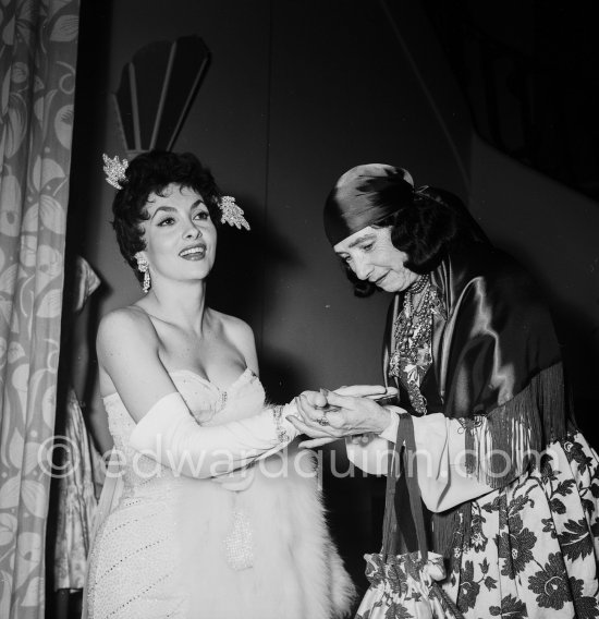 Gina Lollobrigida and the Monte Carlo fortune teller Madame Delyane. Sporting Club, Monte Carlo 1955. - Photo by Edward Quinn
