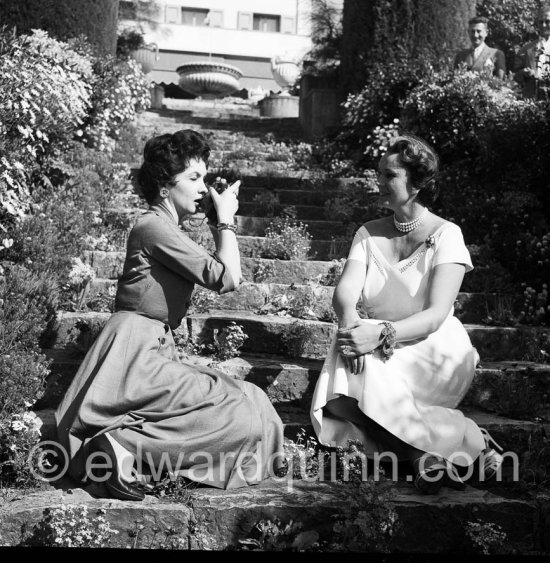 Gina Lollobrigida taking photos of the Begum Aga Khan in front of Villa Yakymour. Cannes 1955. - Photo by Edward Quinn