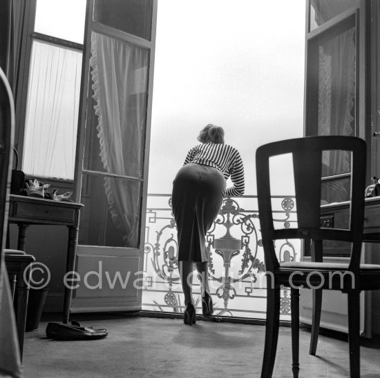 A privileged view: Sophia Loren looking out at the sea from her room in the Carlton Hotel. Cannes Film Festival 1955. - Photo by Edward Quinn