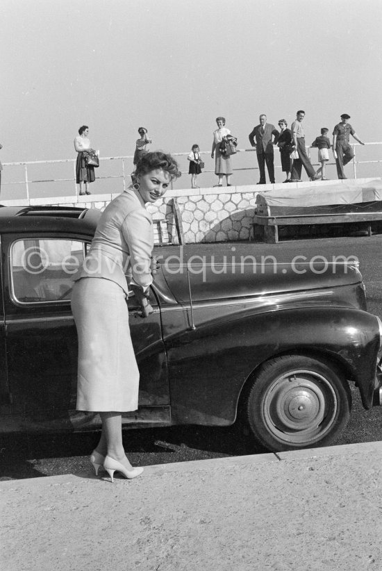 Sophia Loren. Cannes 1955. Car: 1954 or 55 Peugeot 203 limousine - Photo by Edward Quinn